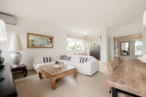 Sink into comfort in our chic living space, perfect for unwinding after a day of exploration.