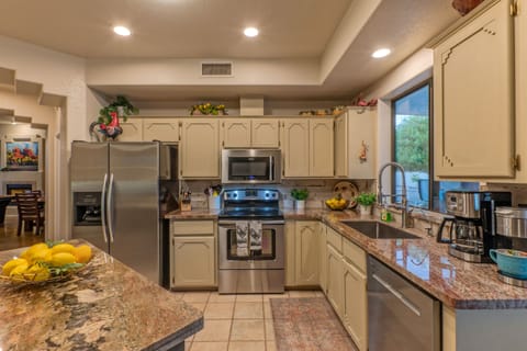 Kitchen includes both Keurig and drip coffee makers and has a great view of the pool and patio.