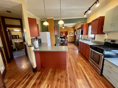 View of kitchen from the entryway. 