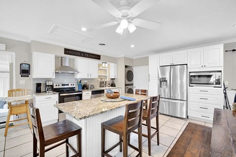 Seating at island for quick lunch or conversation while dinner is being made.