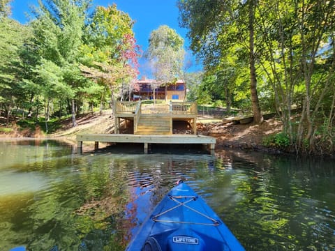 Rear view of dock, property & cabin from the lake (spring/summer)