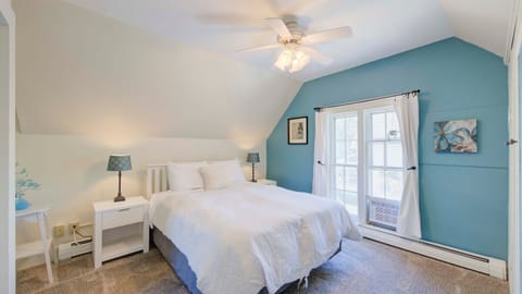 The Iceflower Bedroom has a queen bed, calm decor and beautiful soft sunlight.