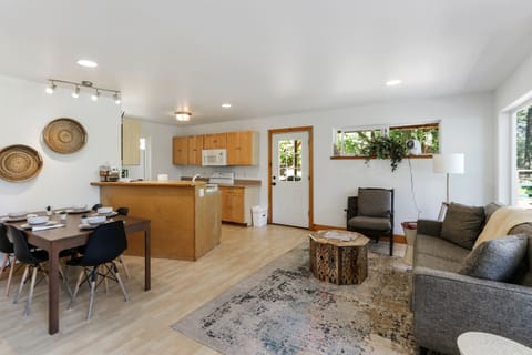 Open plan kitchen & dining. Table extends to seat 10, + folding trays for 12.
