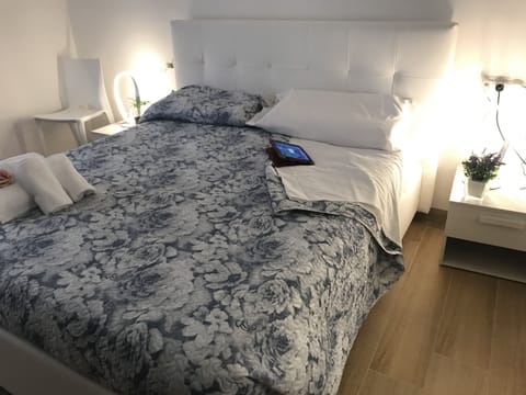 Bed in room 1 B&B Home Sweet Home – Affitti Brevi Italia