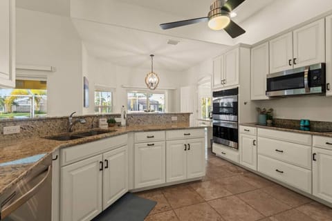 With ample room to move, prep, and gather, this space becomes more than just a kitchen – it's where meals are prepared, memories are shared, and the heart of the home beats with every delicious aroma.