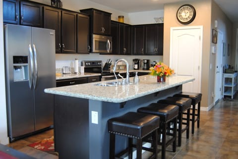 Kitchen is fully stocked with all the essentials for cooking for large groups.