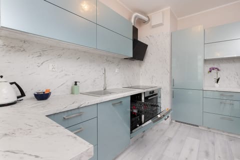 The fully equipped kitchenette includes everything you need for a home-cooked meal.