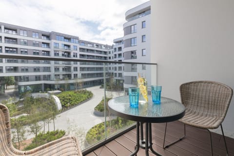 The balcony provides a perfect spot for enjoying the fresh air.
