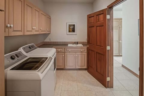 Large laundry room off garage.