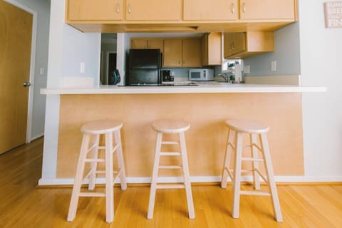 Breakfast bar looking into kitchen, prepare a delicious breakfast before a day at the beach.
