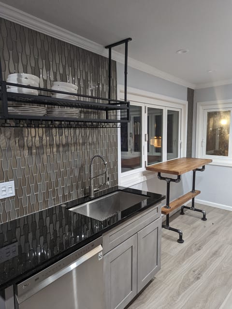 Large sink and dishwasher.  Corner pub table provides great views 2 people watch