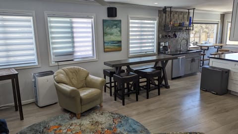 Main living space includes zebra lines for privacy and sun filtering