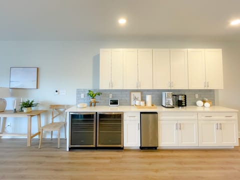 Dry bar: 2 mini fridges, ice maker and coffee station 