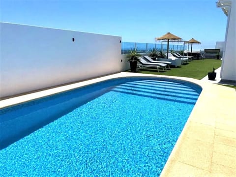 Amazing sea views with heated pool all year