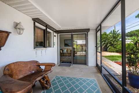 Includes convenient access window to the kitchen for dining al fresco