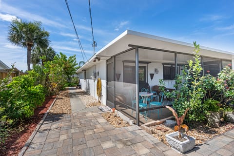 Hose on the side of the home perfect for rinsing sandy items