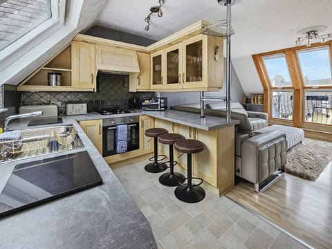 Fully equipped open plan kitchen and living area | Newfold Cottage, Bowness-on-Windermere