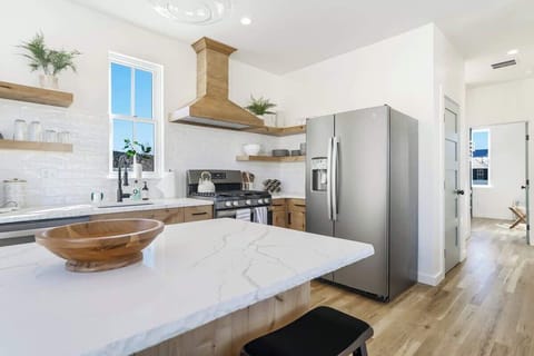 Step into this gorgeous kitchen and let your creativity run wild as you whip up some culinary delights!