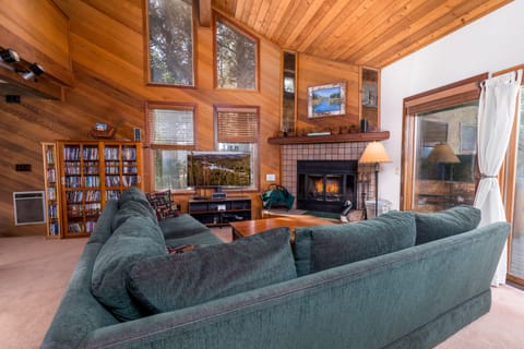 Living room with wood burning fireplace