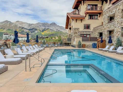 Majestic views from the rooftop terrace with a heated pool and 2 hot tubs. Robes and towels provided. Enjoy the steam room after your dip in the pool