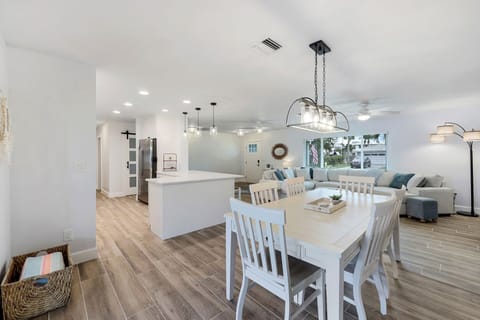 Bright and airy flow from kitchen to dining—perfect for morning coffee or unwinding after a day on the water