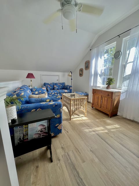 Bright Living room with a tranquil view of the Wilmington River