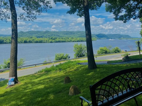 Enjoy the day sitting in the shade watching the boats go by