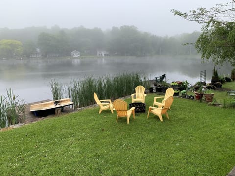 Lower tier back yard with lake at dawn.