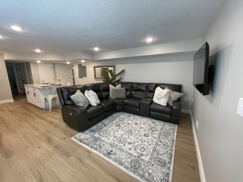 Living room with 50-inch Roku TV to stream all your subscriptions. 
