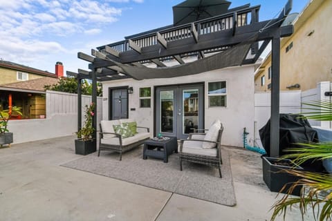 Relax on you private patio after a long day at the beach and cruising the provided beach cruisers on the boardwalk that's one block away.