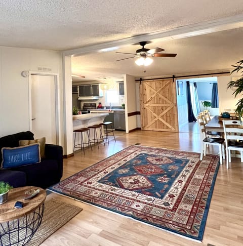 Barn door provides privacy between two living areas 