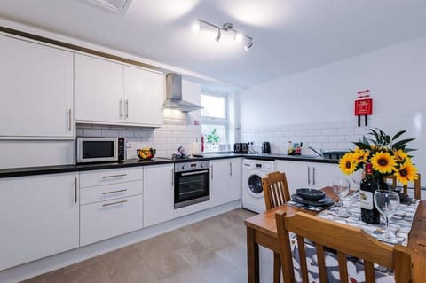 The fully equipped kitchen has everything you need for a long or short stay in Crewe.