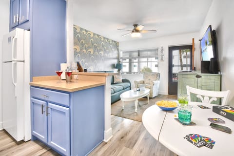 You won't want to close the windows in this unit. Watch the sunset from the sofa!