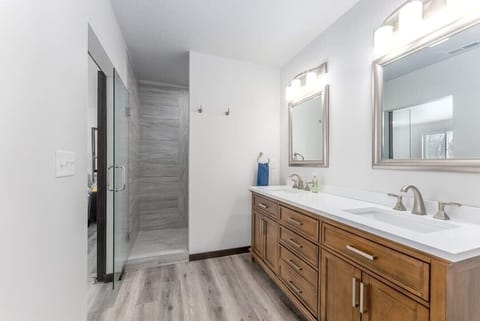 Primary Bathroom
Custom walk-in shower and two sink vanity.