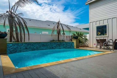 Full view of the amazing communal pool with crystal clear water!