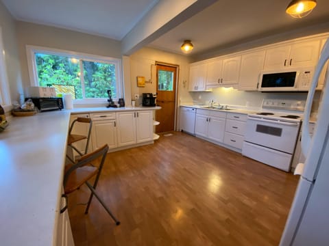 Expansive well equipped kitchen upstairs 