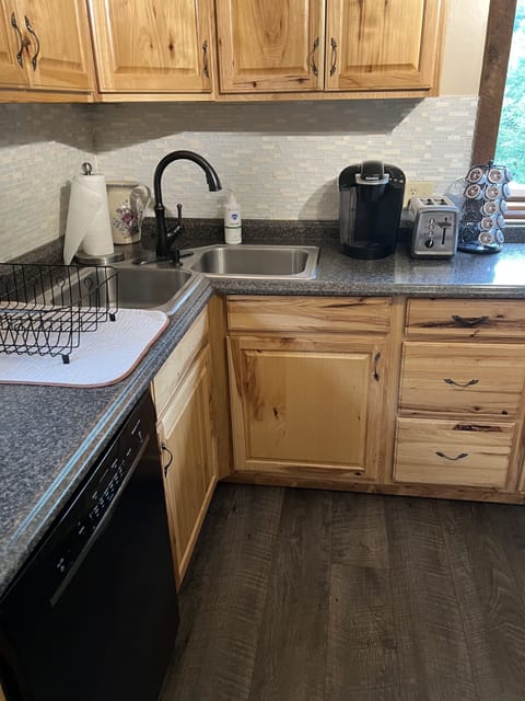 Kerig coffee pot and coffee pods provided along with creamer.