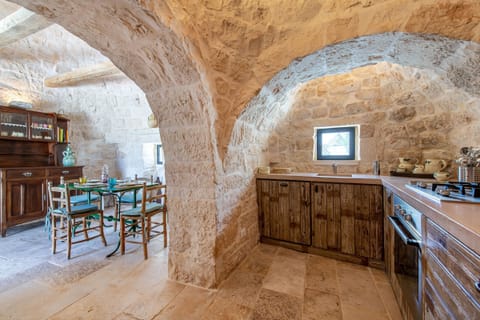 Kitchen with dining room in the separate trulli building
