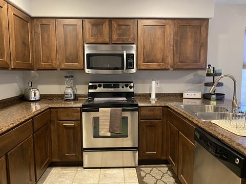 Fully stocked kitchen with all necessities.