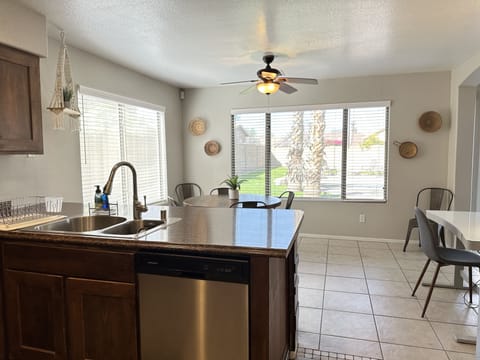 Kitchen sink overlooking the backyard and pool.