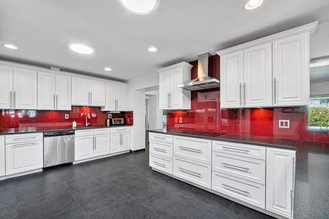 Enormous kitchen. Induction stove. Plenty of granite counter top space.
