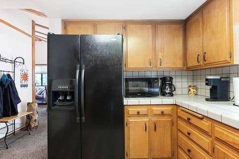 Full Kitchen with coffee maker, Keurig and microwave.