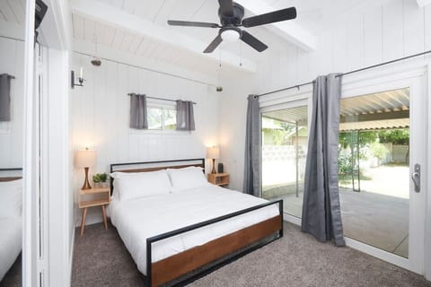 Bedroom 1- King Bed, and an outdoor view.