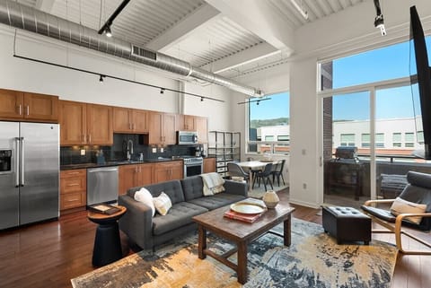 Spacious and professionally-decorated, open-concept living/dining/kitchen