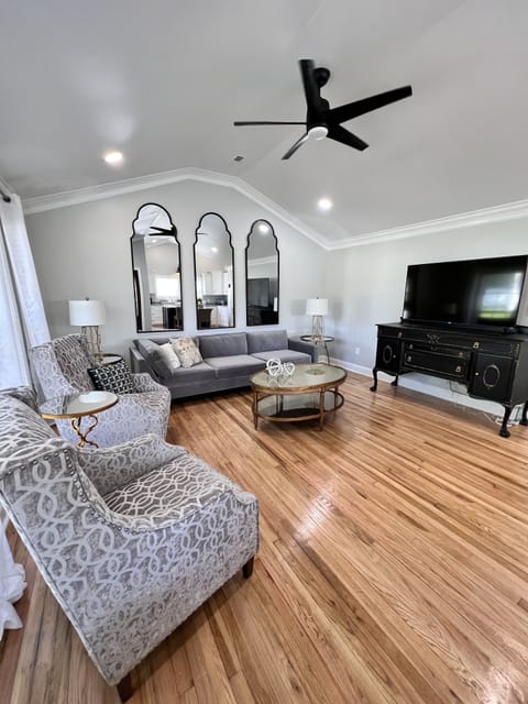 Living room with 60" ROKU Tv