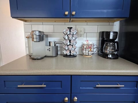 K-Cups, Coffee Creamer, and Drip coffee maker provided.