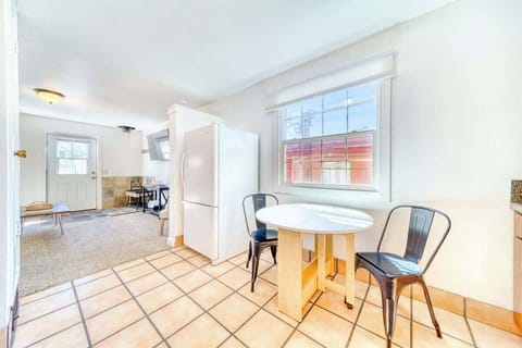 Dining table near fridge