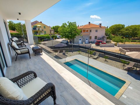 Sky, Property, Water, Plant, Furniture, Building, Cloud, Swimming Pool, Azure, Tree