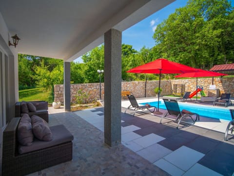 Property, Plant, Sky, Azure, Shade, Lighting, Swimming Pool, Building, Architecture, Outdoor Furniture