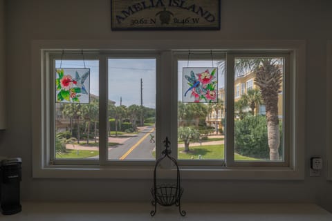 Expansive glass fills the home with natural light and gentle morning warmth.